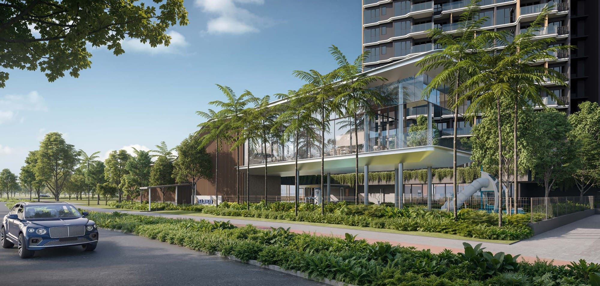 Vela Bay — residential blocks and landscaped drive